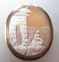 Victorian, circa 1880 Carnelian shell landscape with women. Unmarked 10K Gold or Gold gilded Brooch, signed by Artist.