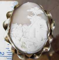 2” Signed Victorian shell landscape women at the village house. Gold filled (?)“twisted rope” Brooch circa 1885. No clasp