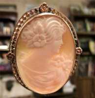 Hand carved Carnelian shell embedded in twisted Gold filled Brooch/Pendant circa 1930