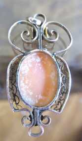 Circa 1915 - 1925 hand carved carnelian shell in unmarked Gold or GF filigree lovelier Pendant