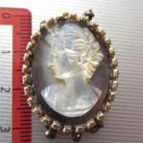 Well hand carved Mother Pearl shell in Gold gilded Brooch/Pendant. Circa 1915