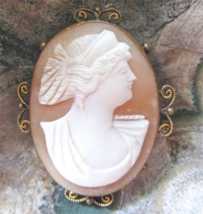 Hand carved Antique conch shell circa 1890-1900 Unmarked Gold or GF filigree pendant