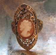 Hand carved shell in then remarkable filigree 18K Gold filled ring. Ring size - 6.5