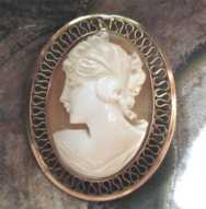 Hand carved young woman’s head - Carnelian shell circa 1945 Marked 14K Gold filled filigree brooch/pendant