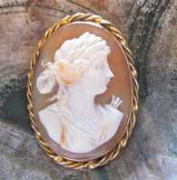 Masterly hand carved shell - image of Muse, circa 1915 In the Gold filled filigree twisted rope Brooch