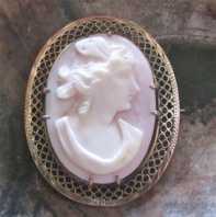 Goddess Psyche profile - hand carved Red & White coral from 1930th . Filigree unmarked Gold or Gold plated brooch.