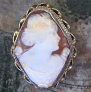 Woman’s head - hand carved shell from 1910th. Silver & Gold filled filigree brooch. Signed.