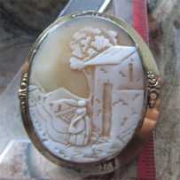 Victorian Antique landscape scene of Woman at the tree Gold Filled floral motif brooch. Circa 1875.