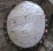 Huge well carved shell town landscape with woman on the bridge Victorian Gold/Gold Filled “twisted rope” brooch. Circa 1875.