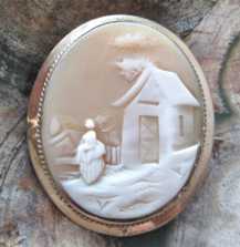 Victorian landscape scene of woman at the little house Gold Filled brooch with twisted ring. Circa 1885.
