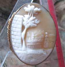 Victorian Antique scene of Woman in the country landscape Gold/Gold Filled double bordered Brooch. Circa 1890.