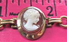 Stylish hand carved 4 Carnelian shell women heads circa 1930th Marked Gold filled the 7.5”bracelet with safety chain vintage