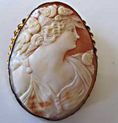 Greatly executed carnelian shell profile Big Gold filled brooch. Circa 1925-1935