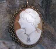 Hand carved young girl profile - vintage from 1930th. Filigree Gold filled pendant/brooch with diamond