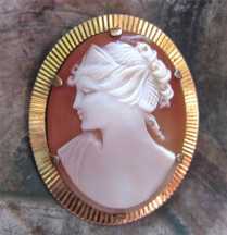 Well hand carved Carnelian shell Roman’s profile. Signed by the Artist Large marked GP Gold plated Brooch/Pendant.