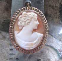 Well hand carved woman’s profile portrait. Circa 1930 Marked filigree 12K Gold filled Brooch Pendant