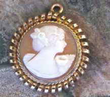 Nicely hand carved feminine profile - vintage circa 1920th. Marked Simmons{?) unique Gold filled pendant