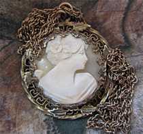 Stylish Art Deco cameo converted to late Audrey Hepburn portrait Yellow Goldish pendant on the 23” Yellow Goldish chain