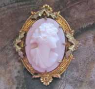 Nicely hand carved feminine profile - petite Coral vintage circa 1915. Unmarked 2 colors Gold/ Goldish brooch. Signed by the Artist