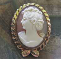 Well hand carved shell profile vintage circa 1935. Unmarked Gold filled brooch/pendant