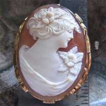 Circa 1925 vintage Great hand carved beauty shell. Unmarked Gold plated brooch. Signed by the Artist