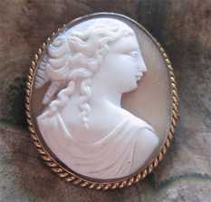Victorian Circa 1850-1875 Antique - carved Sardonyx Classic shell. Unmarked Gold(?)/Gold plated “twisted rope” brooch.