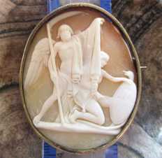 The of Thanatos, the god of Death with symbols of Life & Death Antique shell in the Gold/Gold plated brooch. Circa 1820