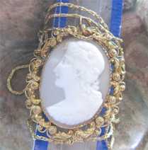 More than 200 years old classic light shell depict Biblical Eve. Unmarked Gold/ Gold filigree pendant with the 24” chain.