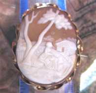 Victorian, circa 1880 shell - village scene with women at the tree Big Gold gilded “twisted rope” bezel brooch.