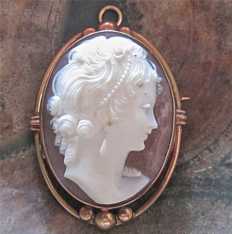 Greatly carved vintage dark Sardonyx shell depict young beauty. Unmarked Gold/Gold filled brooch/pendant. Circa 1920th