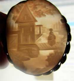 Landscape of Woman on the bridge, creek, tree and houses. Nice carved thin Shell in GF Twisted Frame Pendant. Circa 1890