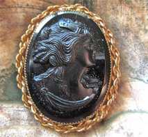 Bakelite (Vulcanite?) detailed Goddess Psyche. Circa 1895-1915 Gold plated/Gold Filled (unmarked) ”twisted rope” Brooch.