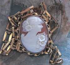 Great detailed hand carved shell pretty young girl. Circa 1925-1935 Unmarked Gold/Gold filled pendant with the 19” chain.