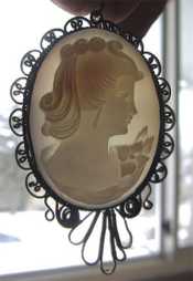 Hand carved light shell Beauty from the 1930-1940, signed by the Artist In the Italian filigree Silver pendant