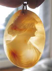 Great hand carved Vintage multi color light shell Gold (?) bail Pendant from the 1915-1935