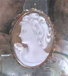 Circa 1940 Great detailed hand carved shell depict young girl. Unmarked Gold/Gold filled brooch/pendant. Signed by the Artist