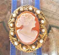 Edwardian, signed by the Artist carnelian shell depict young girl. Unmarked Italian Gold plated filigree pendant/brooch with pearls.