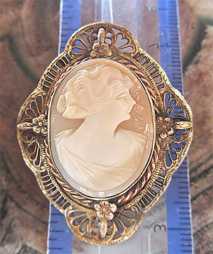 Edwardian hand carved light shell signed by Artist In the filigree Gold plated pendant circa 1930.