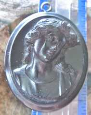 Neoclassic style Gutta Percha deep relief portrait. Large Ancient Pendant from 1880th.