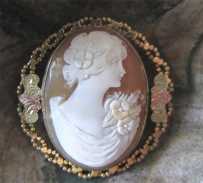Cute profile - great carving 1920-1930th. Shell signed by the Artist. Gold washed silver & 3 colored Gold Decor brooch/pendant.