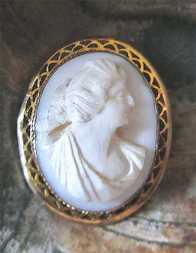 Antique hand carved Coral depict Psyche goddess of Soul & Sex. Gold(?)/Gold filled filigree brooch. Circa 1890-1910