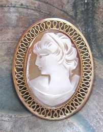 Stylishly well hand carved girlish profile light Conch shell Vintage Marked Gold Filled filigree brooch/pendant from the 1955-1965.