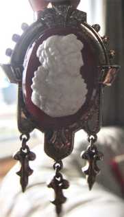 Circa 1850-1870 Biedermeier style Agate(?) woman profile Gold plated etched brooch with C-clasp.
