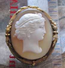 From the 1880 - Greatly carved Victorian Classic Sardonyx shell Unmarked Antique Gold/Gold plated decorated brooch.
