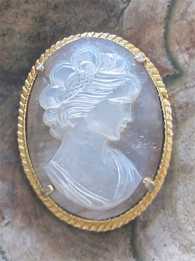 Hand carved Mother Pearl Cameo Signed by Author In the gold covered metal from the 1950th