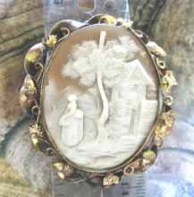 Museum Carved shell - scene of Woman in the Country landscape Intricately done Gold plated Brooch. Circa 1880. Signed.