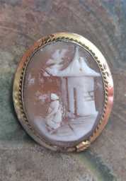 Hand carved circa 1870-1890, shell landscape scene women at the house Victorian Gold gilded bezel brooch.