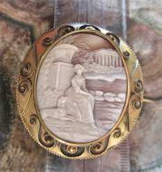 Antique quality carved shell - A woman at a mention with dog. Museum Gold Plated Decorated Brooch. Circa 1850-1880. Signed