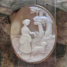 Museum quality carving shepherd girl village scene . Huge Gold Filled Brooch. Circa 1875-1885.