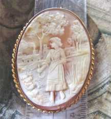 Museum Quality carving peasant girl with a sickle in a field. Huge Gold Filled Brooch & Pendant. Circa 1895-1925.